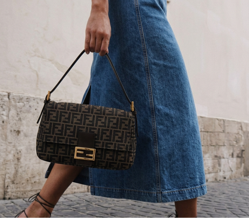 Denim dress street-style editorial with the Fendi shoulder bag