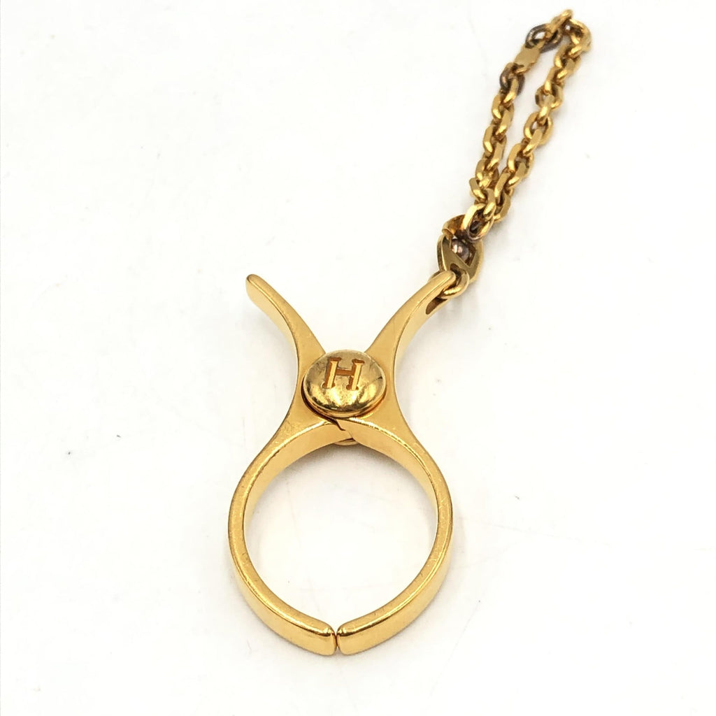 Hermès | Gold Metal Glove Holder Keychain