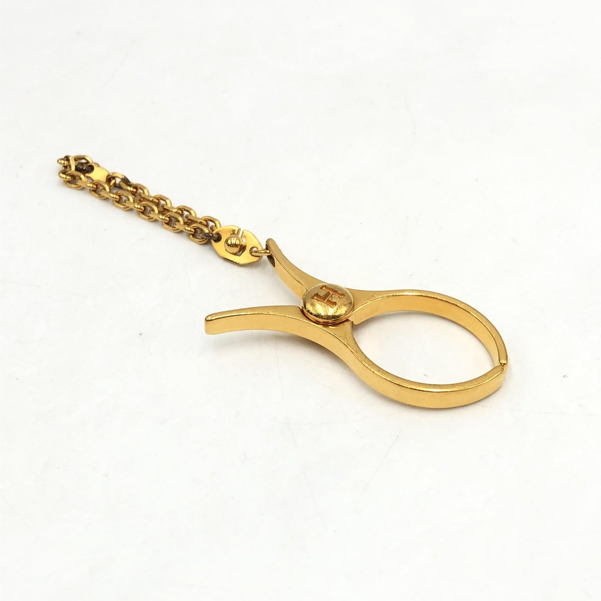 Hermès | Gold Metal Glove Holder Keychain