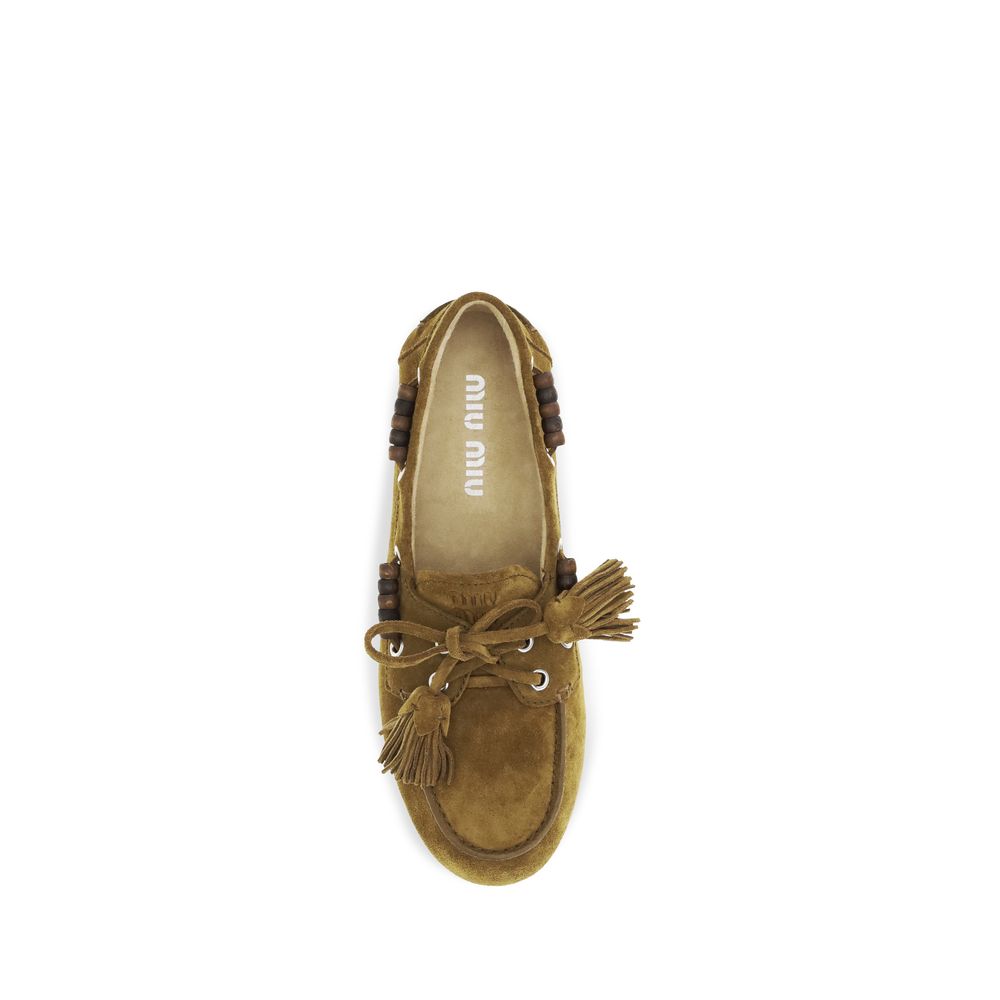 Miu Miu | Beige Calf Leather Bos Taurus Slip-On Loafers